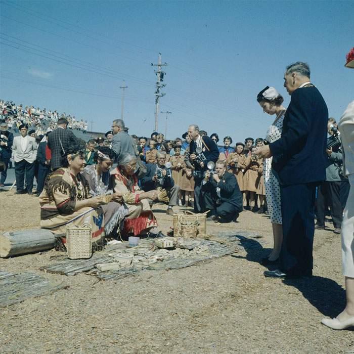 Queen Elizabeth Observing Basket Weaving by First Nations Women